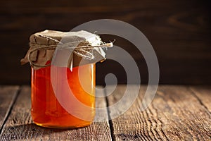 Jar with apricot jam