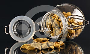 Jar of cardamom pods