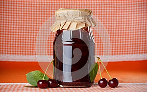 Jar of cherry jam