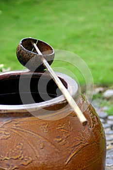 Jar and coconut shell