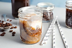 Jar with cold brew coffee and milk