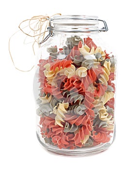 Jar of colourful pasta