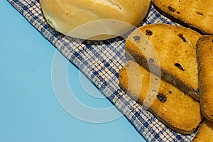 Jar of crispy rusks on blue place mat