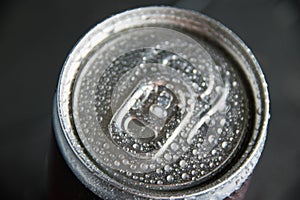 Jar of delicious cold soda drink on a dark background. Feeling cool on a hot summer day