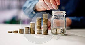 Jar Deposit Concept. Euro Coins Growth photo
