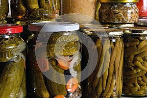 Jar filled with cucumbers, beans, meat mixture, etc. Preserved vegetables in jars, stock for winter