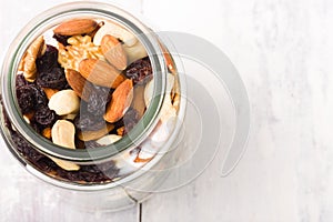 Jar filled with mixed nuts and raisin