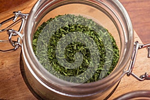 Jar of fresh green herbs