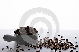 Jar full of coffee seeds whute background