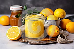 jar of homemade lemon curd with a swirl of yellow