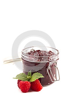 Jar of Homemade Raspberry Jam Isolated on a White Background