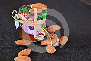 Jar honey and  almonds