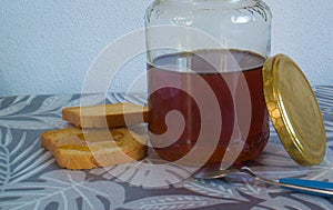 Jar of honey with rusks