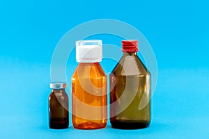 Jar with medical disinfectants and a glass bottle. photo