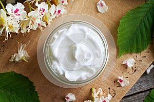 A jar of ointment or cream made from horse chestnut flowers