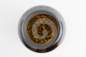 Jar with omega 3 capsules in a cap on a white background