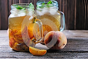 Jar of peach tea shot with selective focus