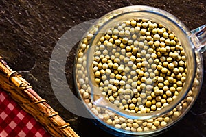 Jar with peas seen from above.