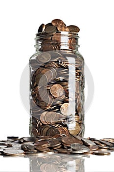 Jar of pennies overflowing