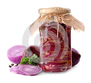 Jar of pickled onions on white