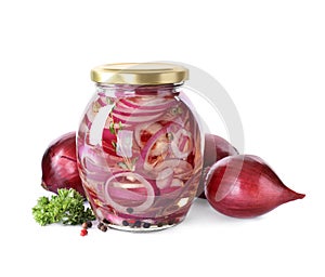 Jar of pickled onions on white