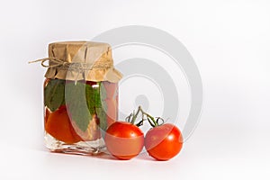 A jar of pickled tomatoes. The Bank contains canned tomatoes