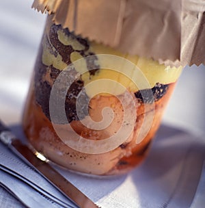 Jar of preserved foie gras with truffles