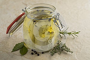 Jar with preserved white organic Dutch goat cheese