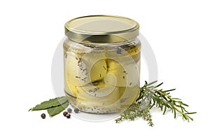 Jar with preserved white organic Dutch goat cheese and fresh her