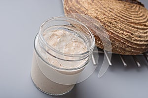 Jar of sourdough starter yeast photo