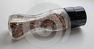 Jar of spices on a white background in the kitchen