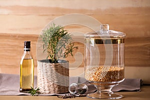 Jar with split peas on table against background. Foodstuff for modern kitchen