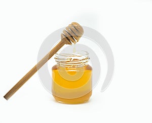 Jar of sweet honey isolate on white background