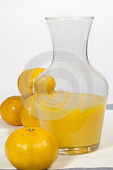 Jar of tangerine orange juice freshly squeezed