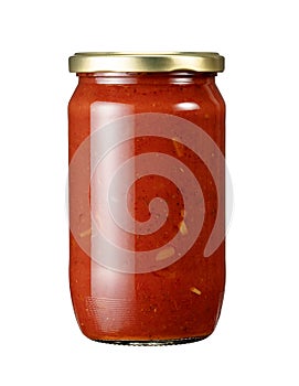 A jar of tomato sauce placed against a white background