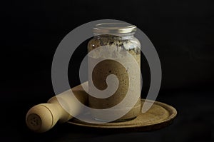 jarred masa madre  natural rye flour photo