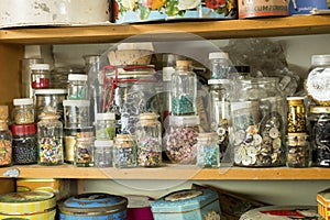 Jars of Buttons and Beads on a Shelf
