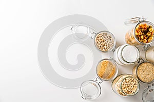 jars with cereals, pasta and beans from top