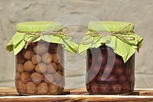 The Jars with fruity compotes . Preserved fruits. photo