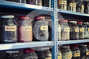 Jars of herbs and powders in a iranian spice shop.