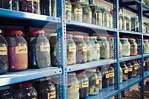 Jars of herbs and powders in a iranian spice shop.