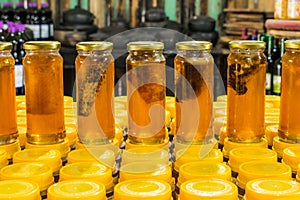 Jars of honey with honeycombs for sale in Sao Francisco de Paula - Brazil