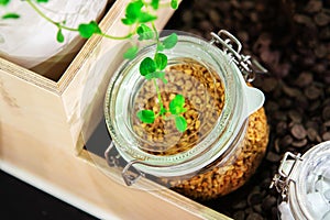 Jars of ingredients are on the shelf. Storage of products in glass containers. Close-up