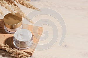 Jars of nourishing cosmetic cream