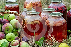 Jars of preserved fruit compote for the winter. Apples and pears