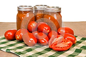 Jars of tomato sauce with paste tomatoes