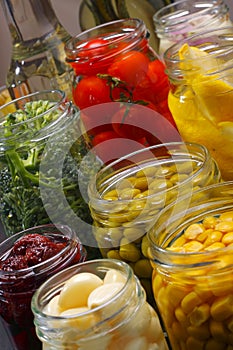 Jars with various preserved food photo