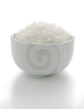 Jasmine cooked rice in a white bowl isolated on white background, Suitable as a design element