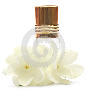 Jasmine flower with perfume bottle