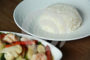 Jasmine rice or white rice in dish and serve with food in restaurant.